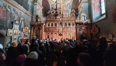 Three churches filled with believers during Vespers in the Lavra