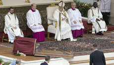 A large icon of Christ falls near Pope Francis during Easter Mass