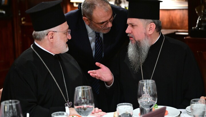 Dumenko explaining the essence of prayer to Archbishop Elpidophoros. Photo: Dimitrios Panagos
