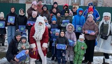 Children receive gifts from UOC Primate in Kherson Eparchy