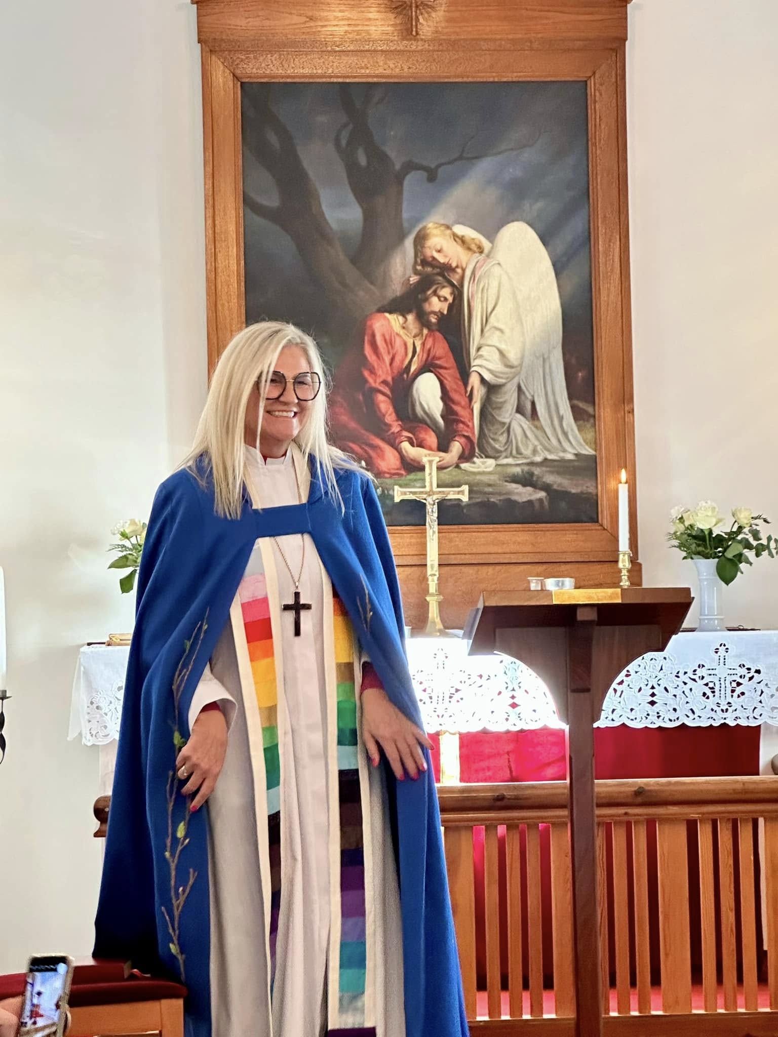 Gudrun Helgadottir in an LGBT-colored stole