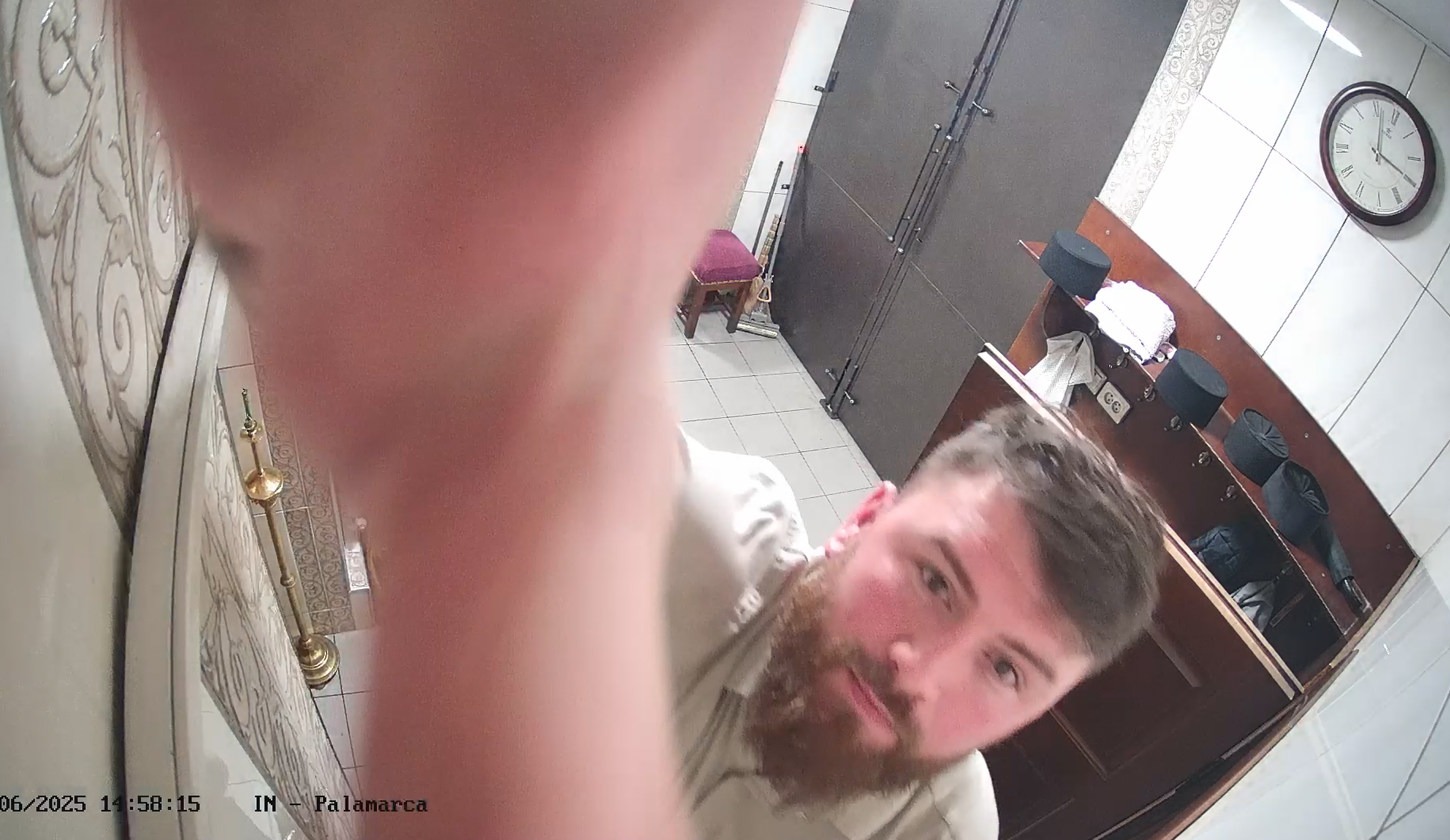 Vasyl Kapriyan breaking a camera in the Holy Spirit Cathedral.